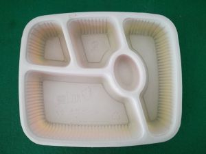 精密四柱裁斷機在工業中沖裁物料的機器